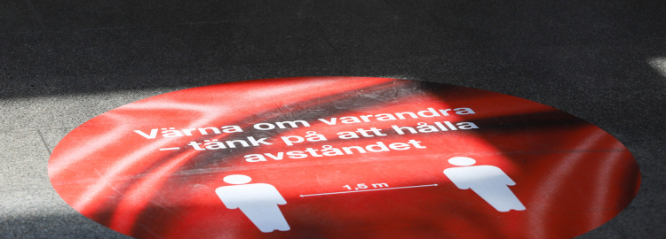 skylt om att hålla avstånd